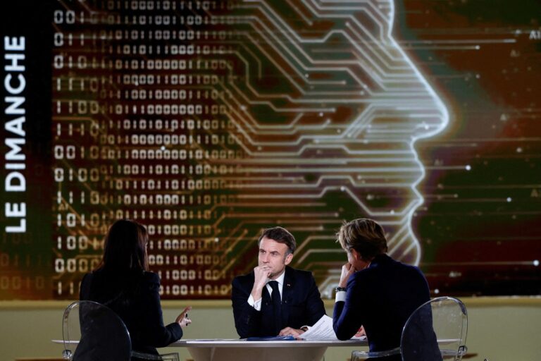 French President Emmanuel Macron answers questions of French Journalist Laurent Delahousse and Indian Journalist Palki Sharma Upadhyay during a televised interview broadcasted on TV channel France 2 and in India on the eve of the Artificial Intelligence (AI) Action Summit, at the Grand Palais, in Paris, on February 9, 2025.