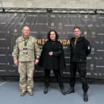 Coinvest Capital managing partner Viktorija Trimbel with Lieutenant Colonel Linas Idzelis (in uniform) and Lieutenant Colonel (retired) Valerijus Šerelis at the 'Fire Shield' hackathon