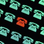 green telephone icons in a pattern with one single red telephone indicating a malicious call