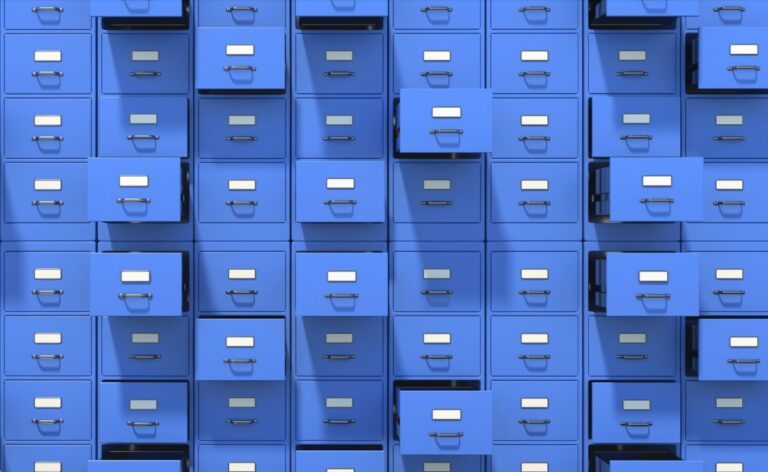 An illustration of stacks of blue filing cabinets, some drawers opened